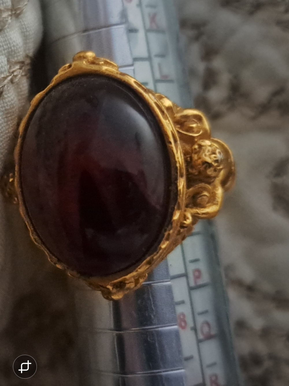 Avon Gold-Tone Ring with Deep Burgundy Oval Stone